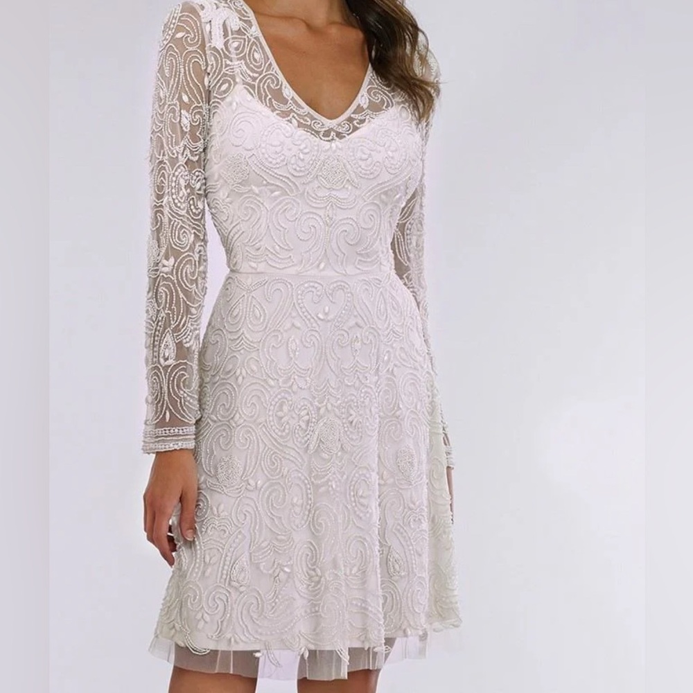 Elegant White Beaded Dress